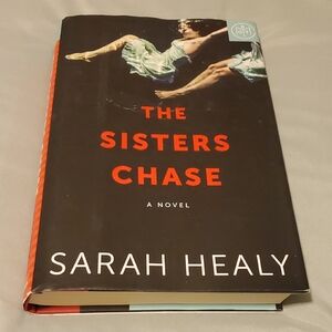 The Sisters Chase by — Black & Red Hardcover Coffee Table Book